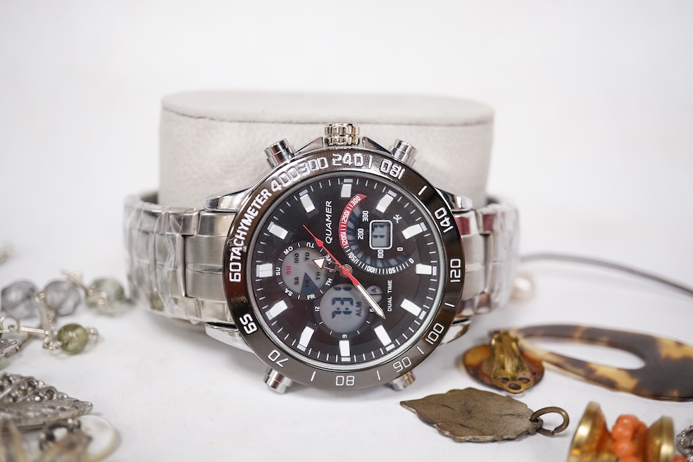 A small quantity of assorted mainly costume jewellery including a pair of malachite earrings and a graduated coral bead necklace, together with an Omega watch box and a gentleman's Quamer quartz wrist watch. Condition -